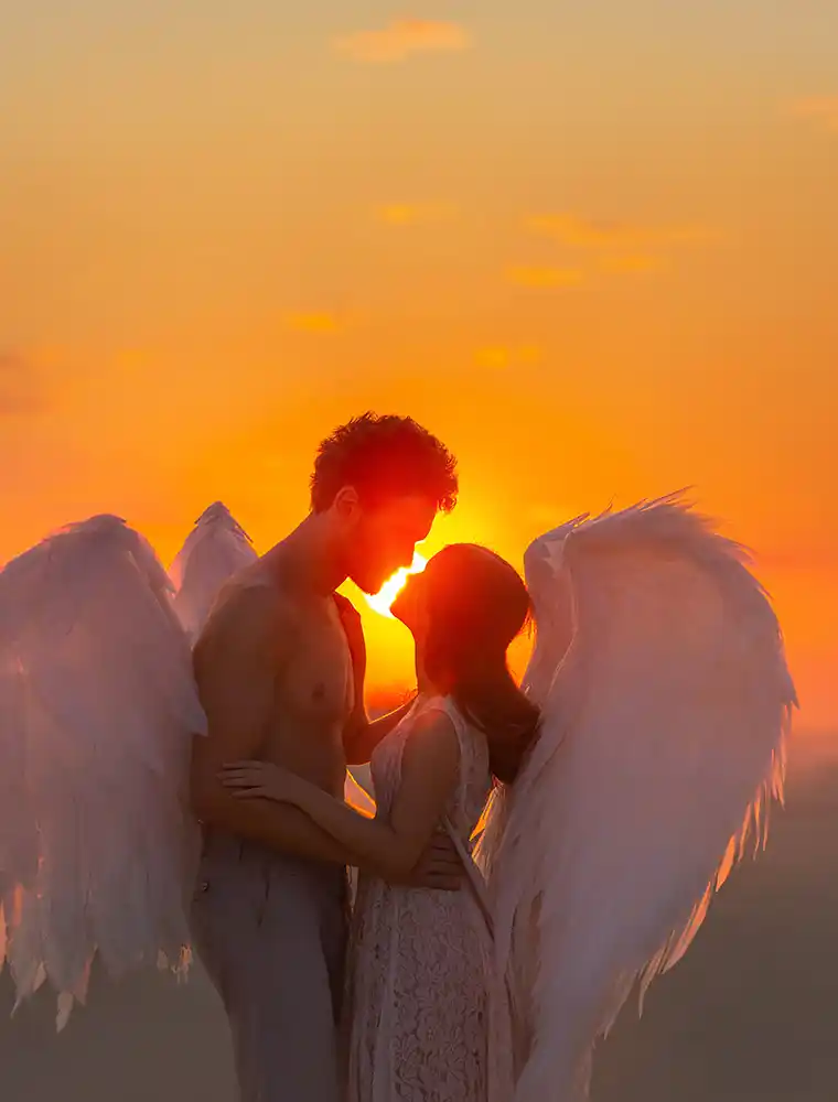 two angels meet at sunset