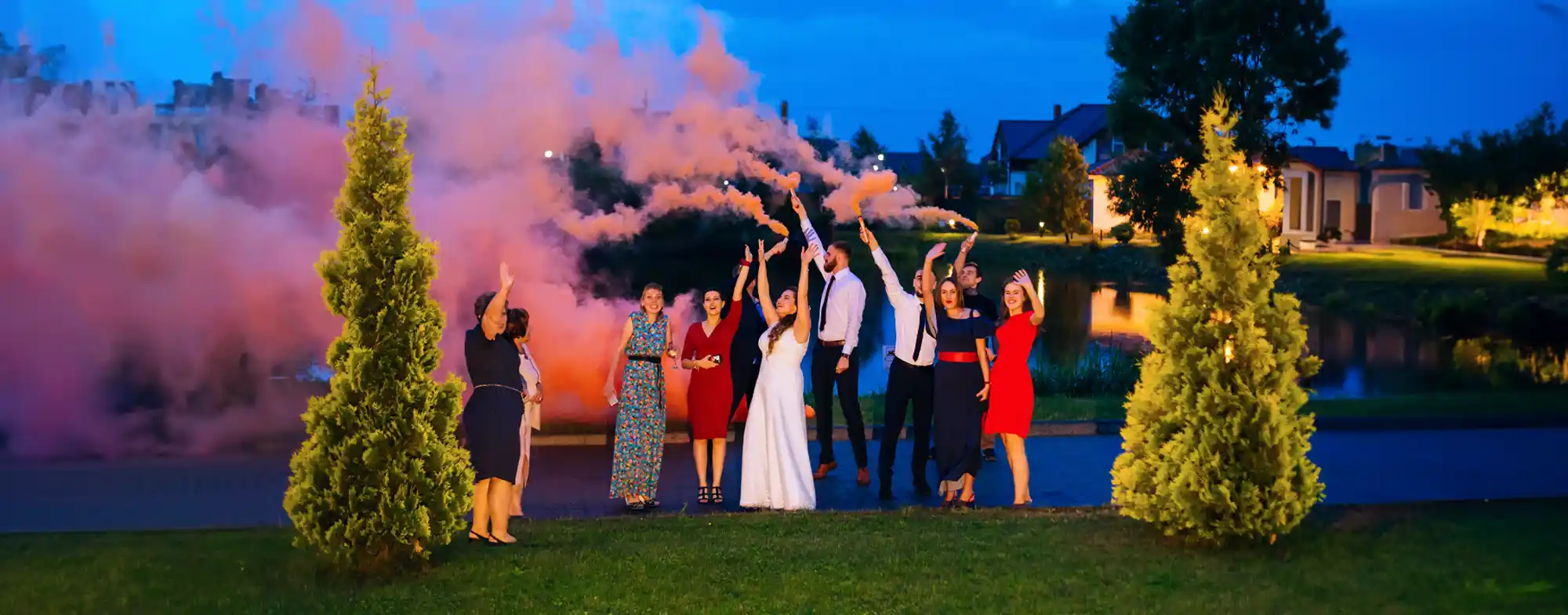 wedding celebration with orange smoke